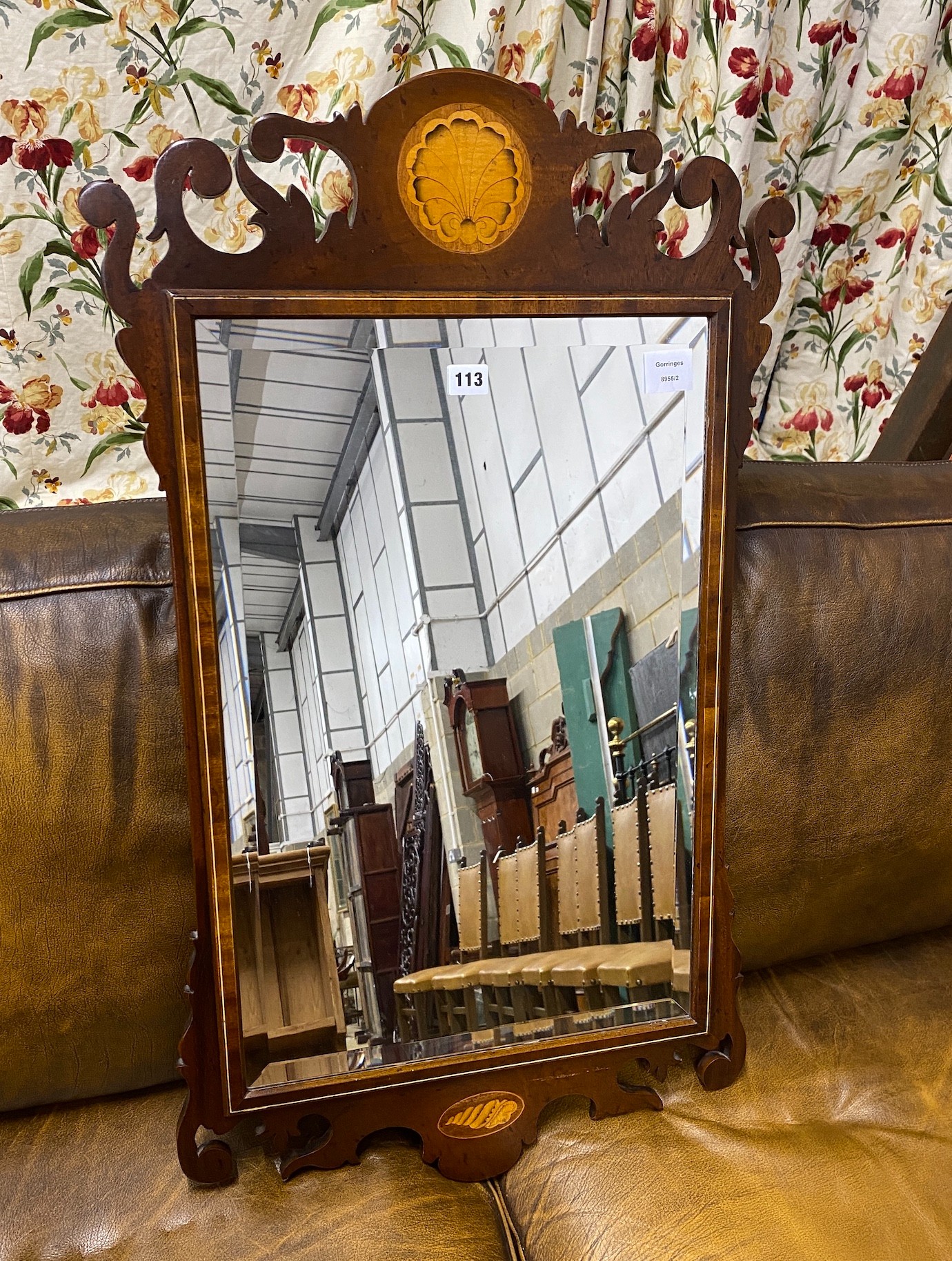 A George III style shell inlaid mahogany fret cut wall mirror, width 52cm, height 91cm